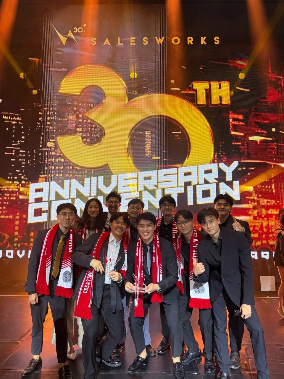 Dayone team celebrating an award